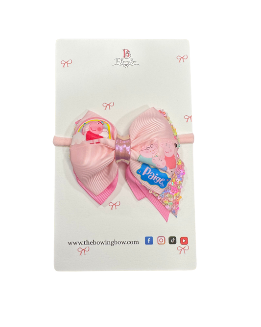Peppa Hair Bow on a Nylon Headband by The Bowing Bow